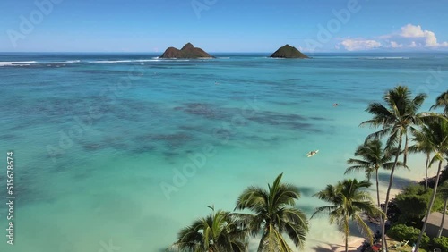 Aerial view over the Lanikai beach with islands in the background in HD photo