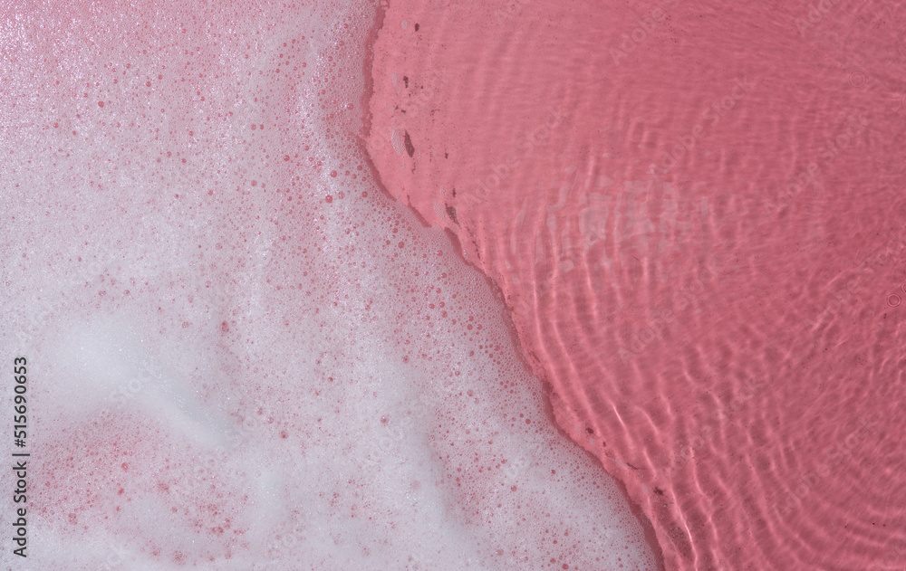 Foam bubbles abstract pink background,top view