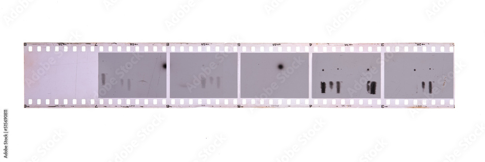 long and underexposed dia positive film strip isolated on white background,35mm film strip
