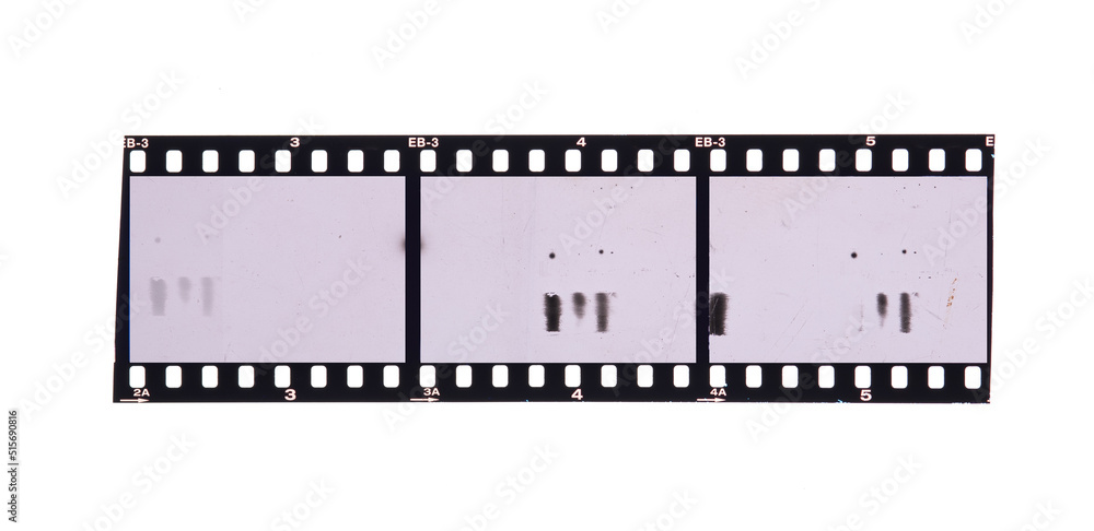 long and underexposed dia positive film strip isolated on white background,35mm film strip