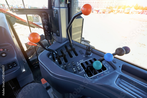 Fototapeta Control panel in the cab of a modern tractor