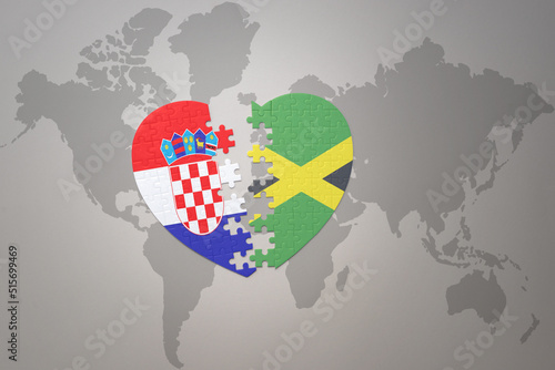 puzzle heart with the national flag of croatia and jamaica on a world map background.Concept.