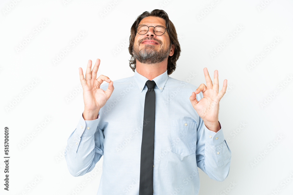 Senior dutch business man isolated on white background in zen pose Senior dutch business man isolated on white background in zen pose