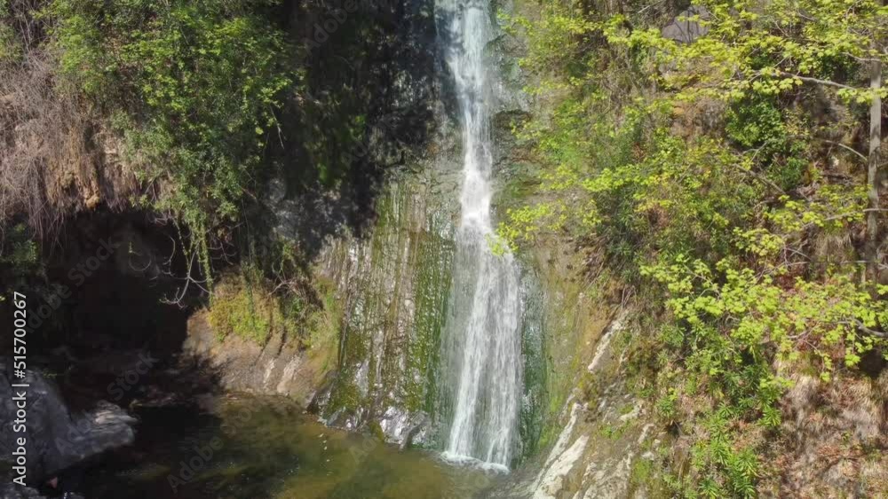 Beautiful waterfall in green forest, top view. Tropical in mountain jungle. Waterfall in the tropical forest. Big Waterfall in 4k. High quality 4k footage Beautiful waterfall in green forest, top view. Tropical in mountain jungle. Waterfall in the tropical forest. Big Waterfall in 4k. High quality 4k footage