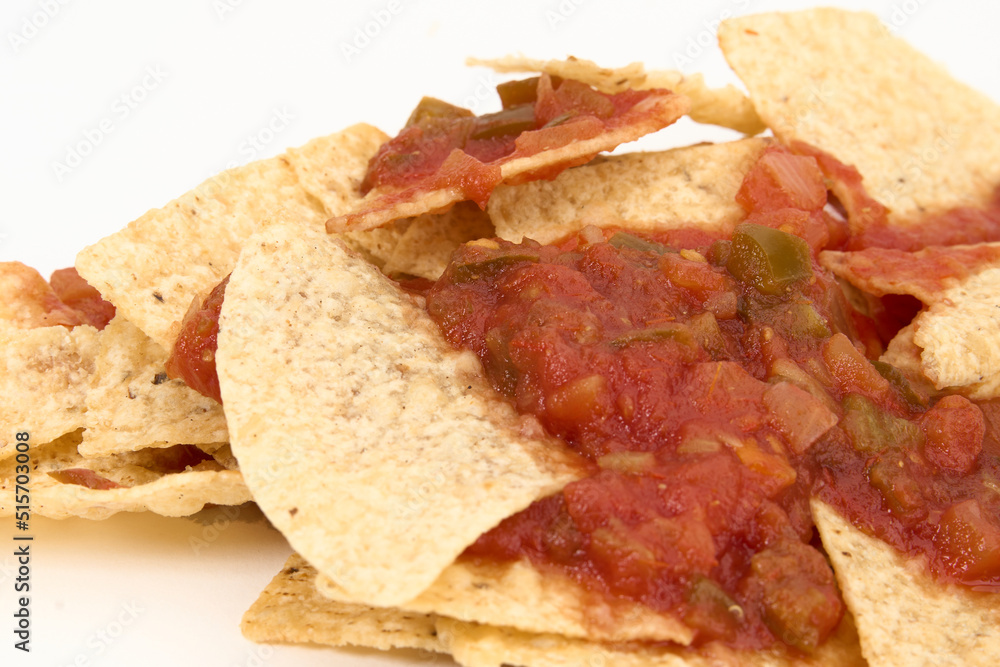 closeup chips and salsa isolated on white background 