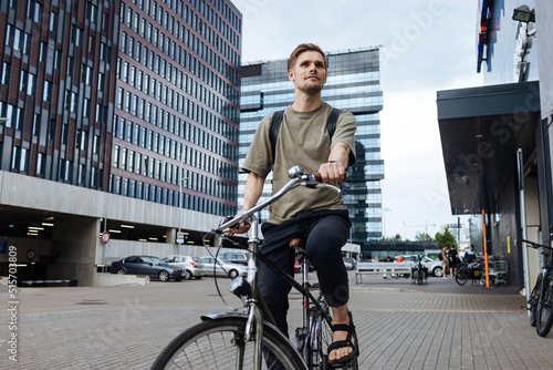 Photography Young man riding a bike