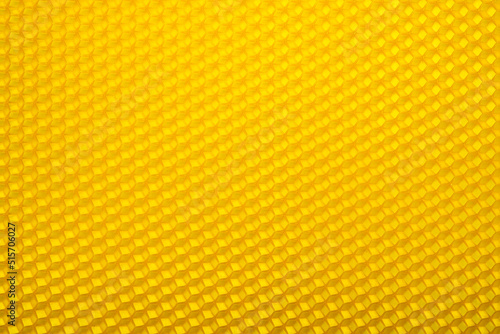 Candles Wax Sheet. A set of honey wax to create candles. Beeswax for honeycomb. Yellow pure beeswax hexagon pattern