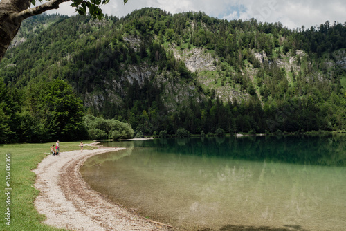 lake in the forest under the mountain
