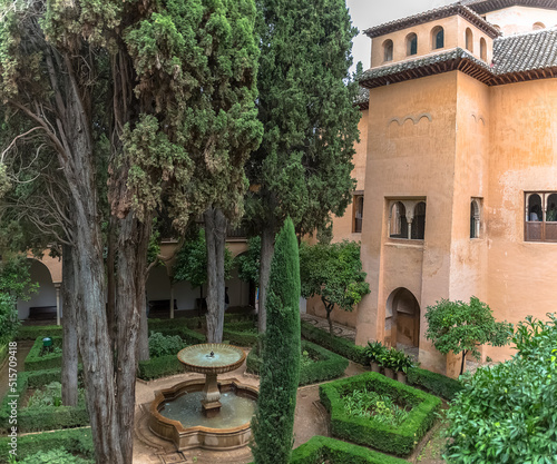 Fototapeta Naklejka Na Ścianę i Meble -  Aerial view at the Daraxa´s garden, on Nasrid Palaces inside the Alhambra fortress complex located in Granada, Spain