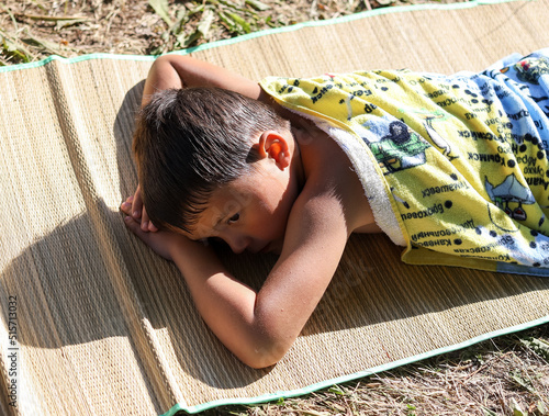 baby sleeping on the beach