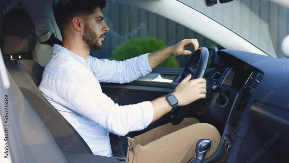 Protection of person in vehicles. Fasten your body with a seat belt in the car. Bearded man fastens car seat belt with hand. Compliance with safety rules for driving. Road safety regulations concept Protection of person in vehicles. Fasten your body with a seat belt in the car. Bearded man fastens car seat belt with hand. Compliance with safety rules for driving. Road safety regulations concept