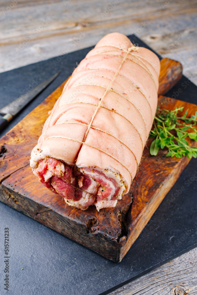 Traditional raw Filipino lechon kawali pork belly roll meat as piece ...