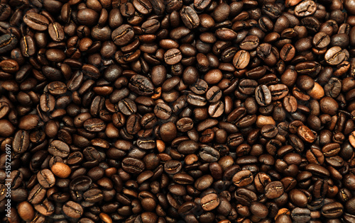 Close-up of roasted brown coffee beans background 