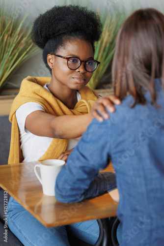 Wallpaper Mural moral support and mental health, African American woman supporting a colleague in a difficult situation, words of support or help with advice, communication between patient and psychologist, spiritual Torontodigital.ca