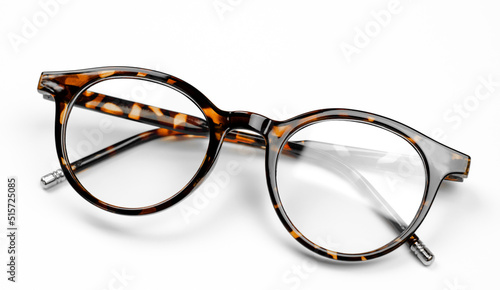 Stylish leopard-colored eyeglasses on a white background