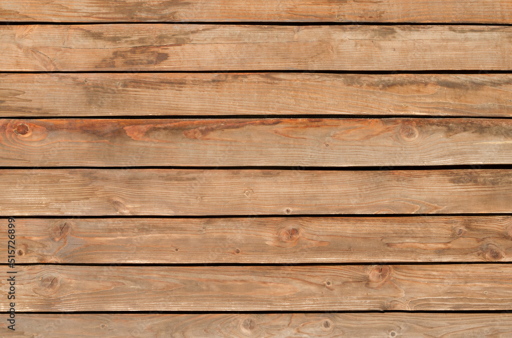 Natural brown wood texture background. Wood planks. Top view Natural brown wood texture background. Wood planks. Top view