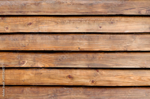 Natural brown wood texture background. Wood planks. Top view