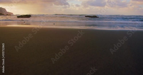 Wallpaper Mural Evaporation of water on the shore of Atlantic ocean, foamy waves in the early sunny morning. Empty black sand beach in Tenerife island. Relaxation ideal view. Canaries. Torontodigital.ca