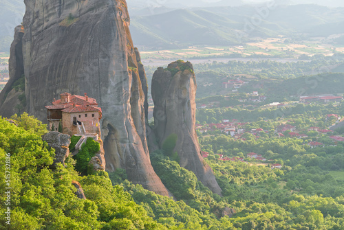 Stone monastery in the mountains. Kalabaka, Greece summer cloudy day in Meteora mountain valley. close up photo