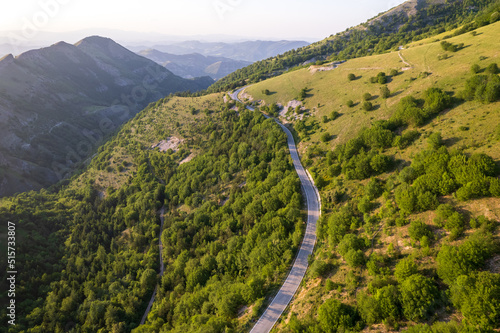 Aerial view of curvy road on monte Nerone slope in Marche region in Italy 