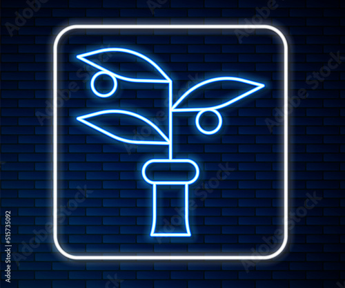 Glowing neon line Plant breeding icon isolated on brick wall background. Plants growing in the test tubes. Organic food ,agriculture and hydroponic. Vector