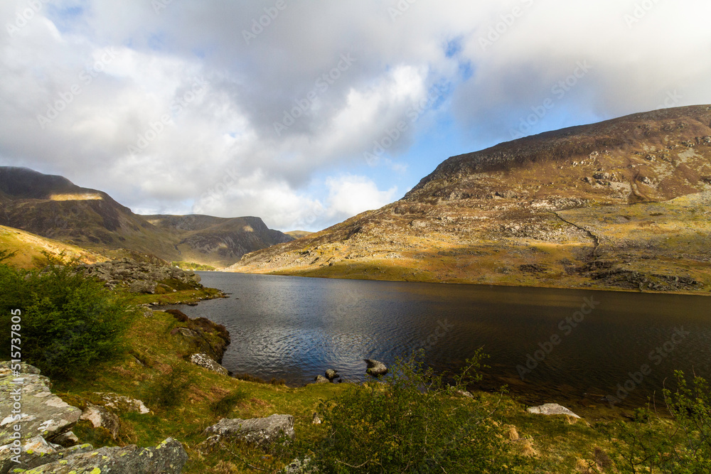Beautiful lake and Mountains Sun and cloud. Ogwen Cottage, Snowdonia, Wales.