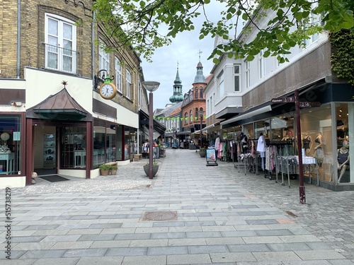Obraz na plátně pedestrian zone with shops in the town centre of Lemvig with view to the church