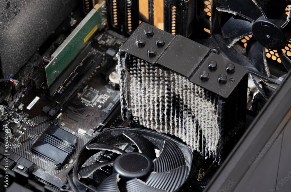 Stockfoto Dirty CPU cooler heatsink. Dust on the air fan for the