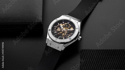 Skeleton watch on black background