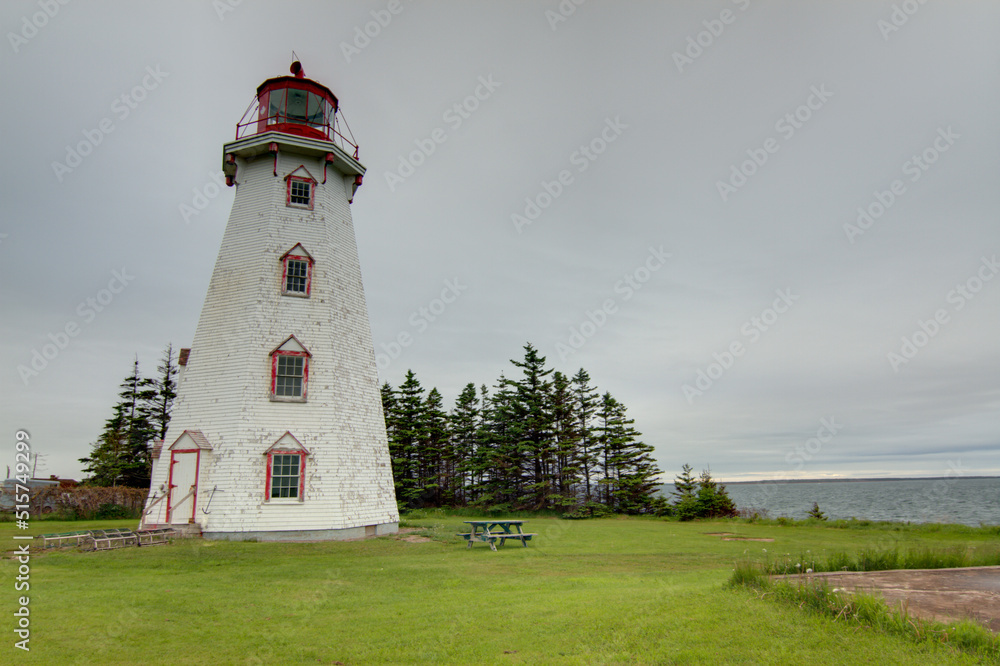 windowed lighthouse on the coast