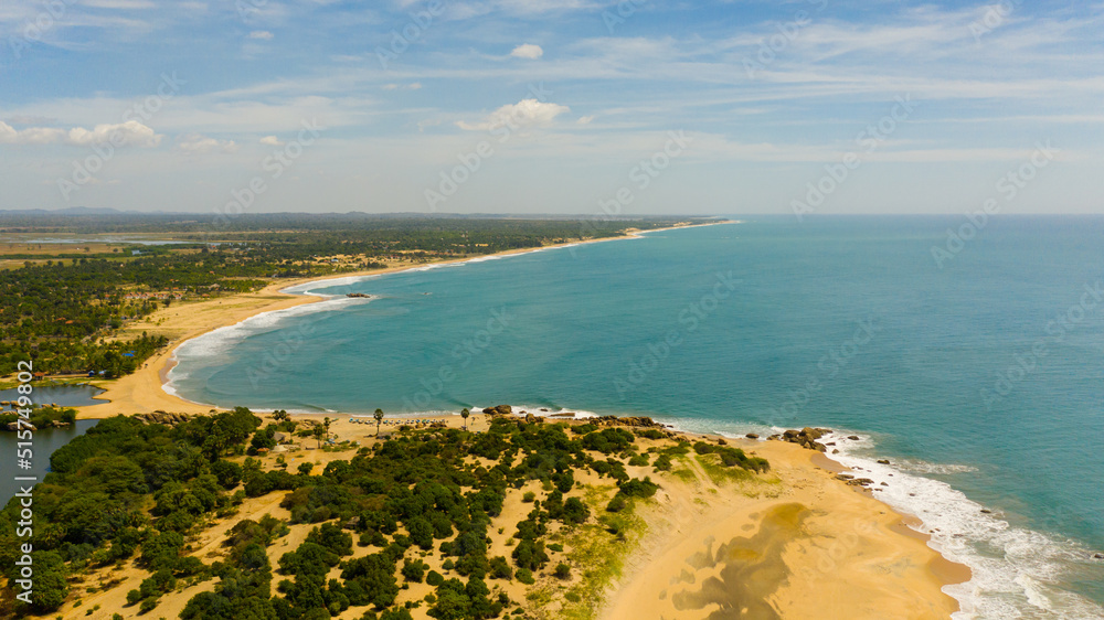 Top view of coastline of Sri Lanka with the beach, river and agricultural land.