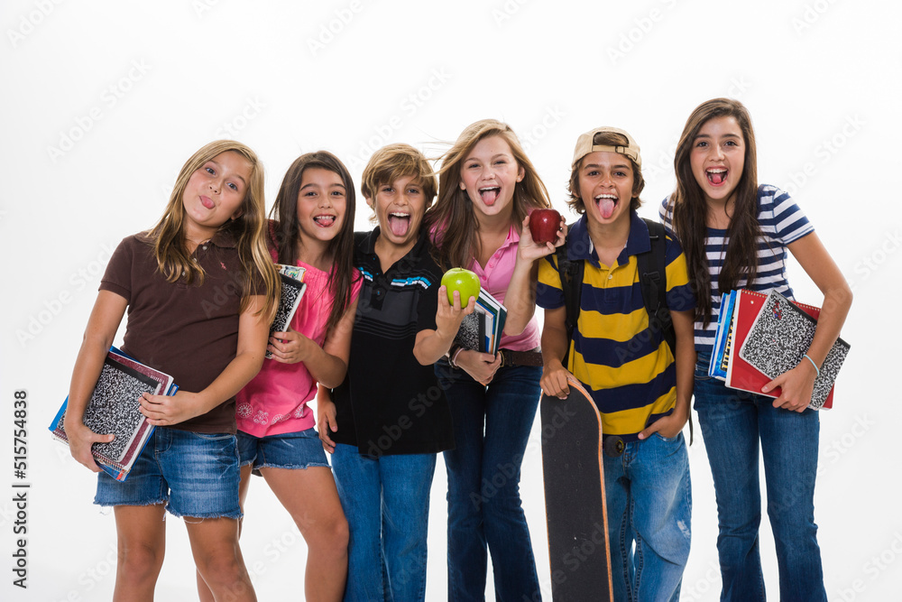 Portrait of boys and girls back to school in a studio Portrait of boys and girls back to school in a studio