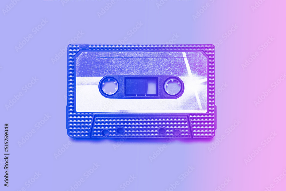 Retro tape cassette tinted in pink and purple colors.