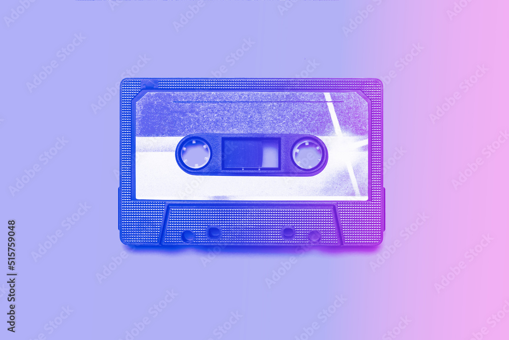 Fototapeta premium Retro tape cassette tinted in pink and purple colors.