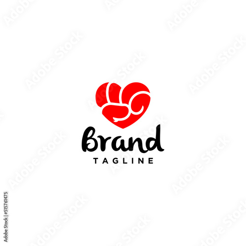 Hand Grips form a Heart Symbol Logo Design. The Fist Forms A Symbol Of The Heart.
