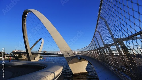 Beautiful full HD daylight footage at Perth city bridge in Swan river while cyclist pass over Perth city CBD, Western of Australia 
