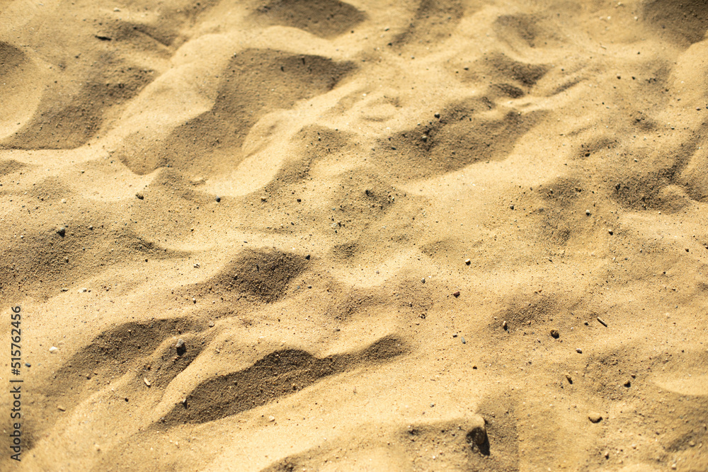 Yellow sand on beach. Texture of sand. Summer background. Yellow sand on beach. Texture of sand. Summer background.
