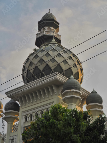 the dome of the jami mosque in the city of Malang, the dome of the big mosque and the minaret photo