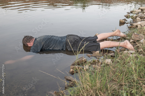 a dead man was found near the river, a dead man was drowned in a pond lake swamp