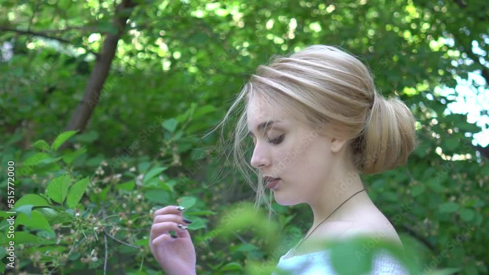 Slow Motion Young beautiful bride in the garden Slow Motion Young beautiful bride in the garden