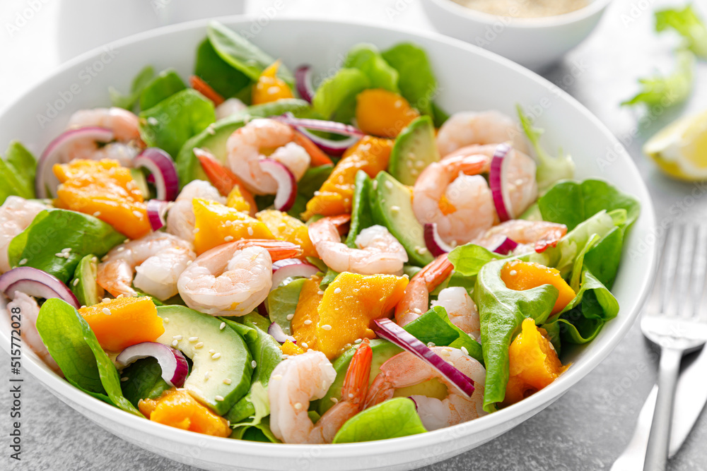 Shrimp, avocado and mango salad with fresh green lettuce. Prawn salad Shrimp, avocado and mango salad with fresh green lettuce. Prawn salad