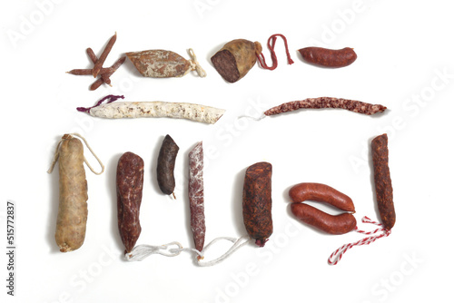 high angle view of collection of various sausage on white background