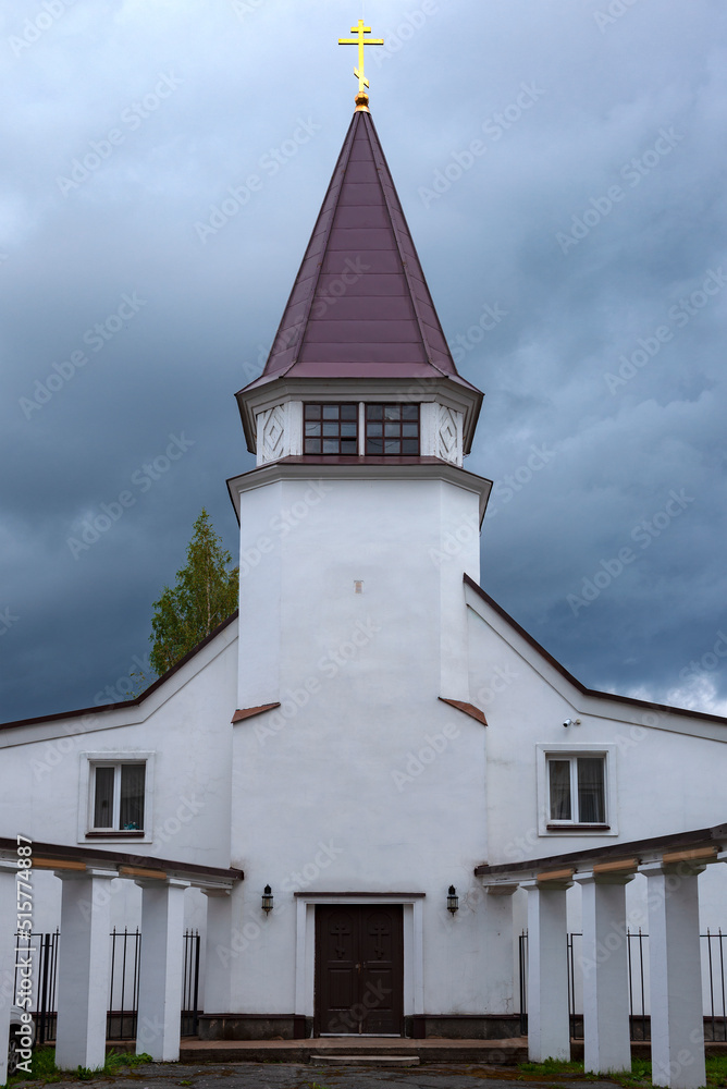 Church of St. John the Theologian (1931) under a stormy sky on a August day. Sortavala, Karelia. Russian Federation