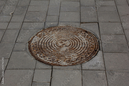 Old cast iron manhole cover