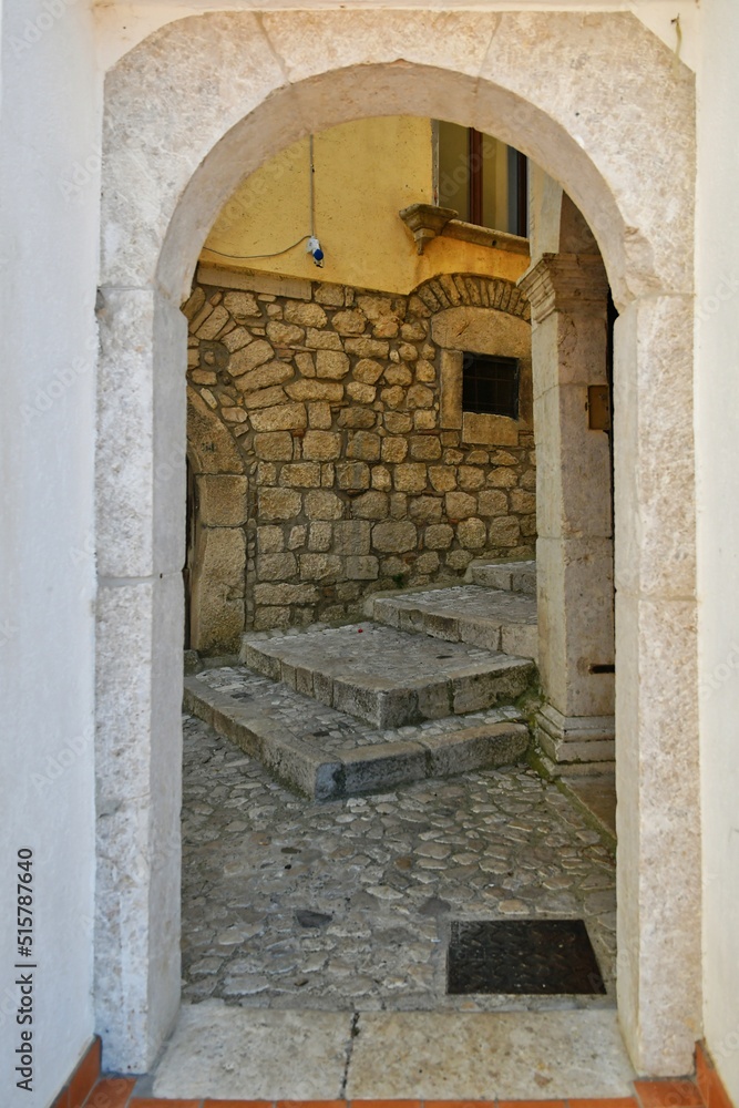 A narrow street between the old houses of Guardia Sanframondi, a village in the province of Benevento, Italy.
A narrow street between the old houses of Guardia Sanframondi, a village in the province of Benevento, Italy.
