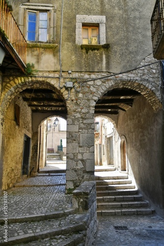 A narrow street between the old houses of Guardia Sanframondi  a village in the province of Benevento  Italy.  