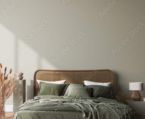 Bedroom mockup in bright interior background with rattan wooden furniture on green wall, 3d render