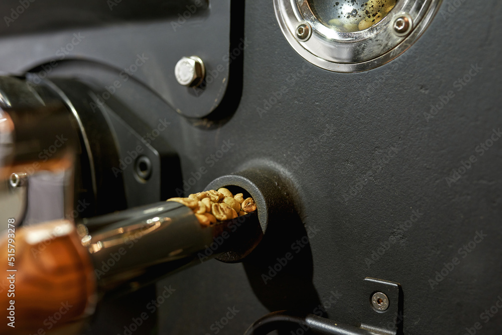 Cropped close up of coffee roasting machine Cropped close up of coffee roasting machine