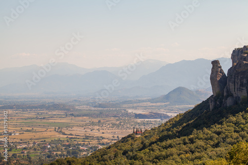 Kalampaka town with Metora cliffs and monastery, Greece photo