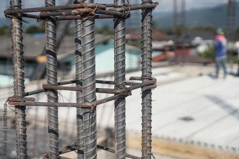 A deformed steel bars frame inside concrete footing or floor. Stock